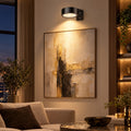 The Gallery battery spotlight lighting a large painting
