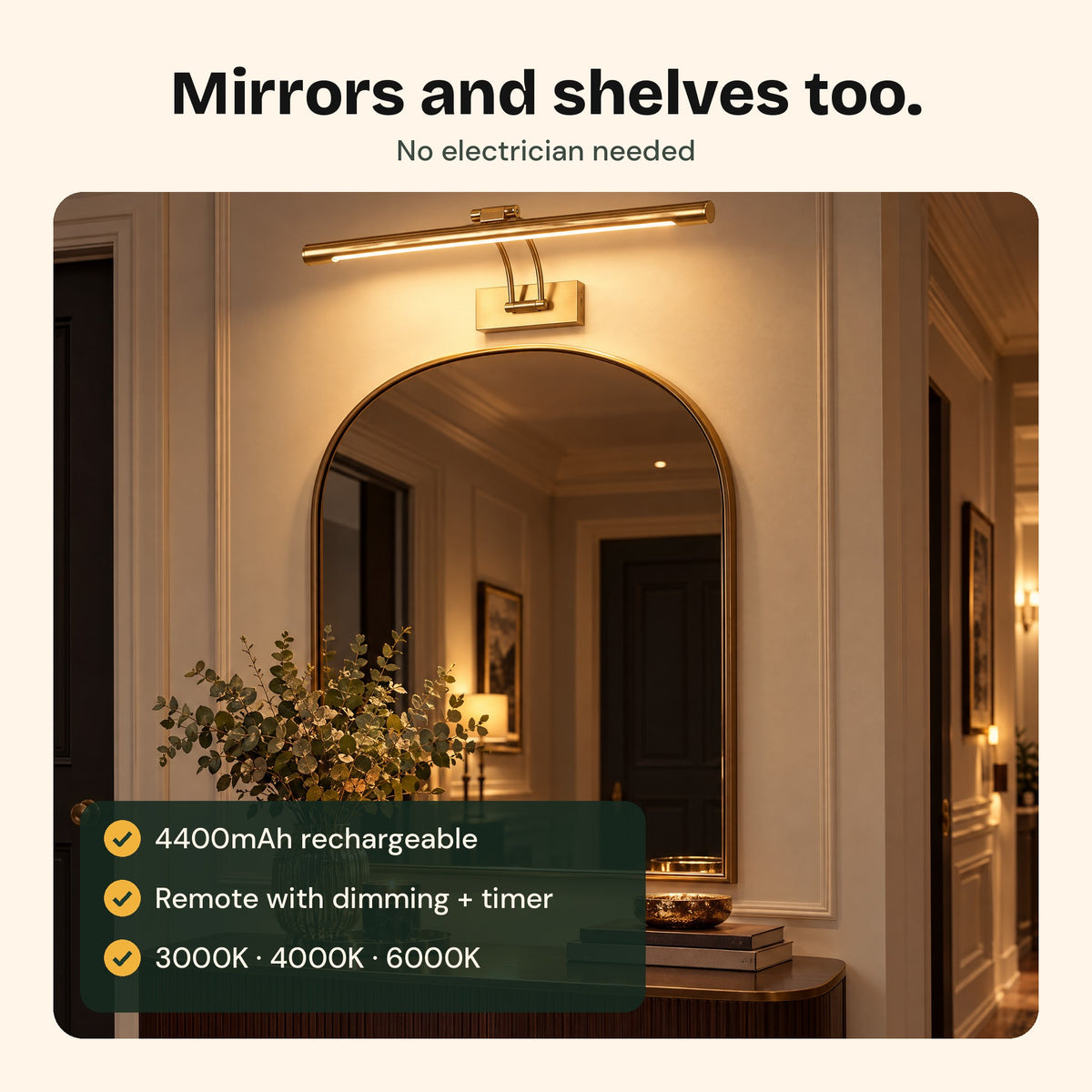 The Gallery XL lighting a mirror above a console table