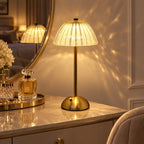 The Gem crystal touch lamp glowing on a dressing table