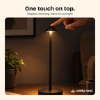 Finger touching the top of The Perch to switch it on
