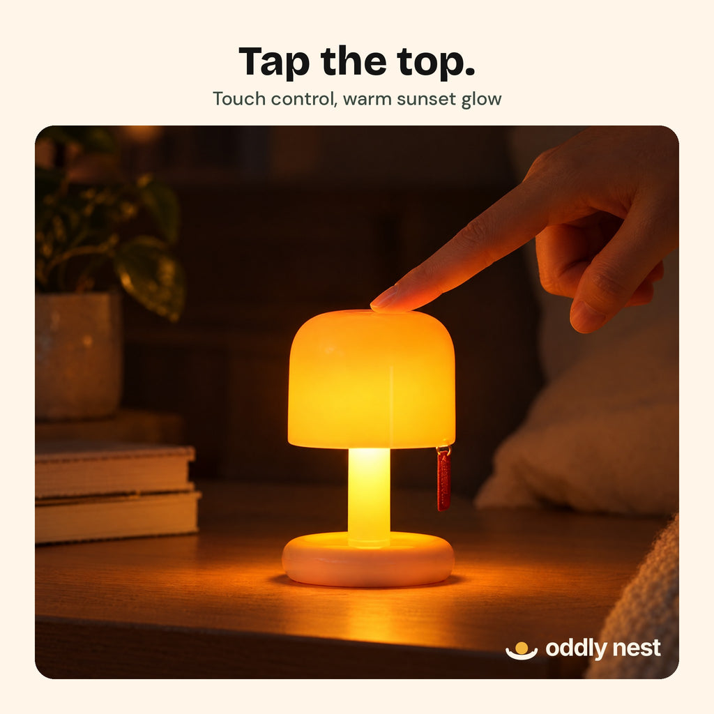 Finger tapping the top of The Toadstool lamp
