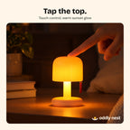 Finger tapping the top of The Toadstool lamp