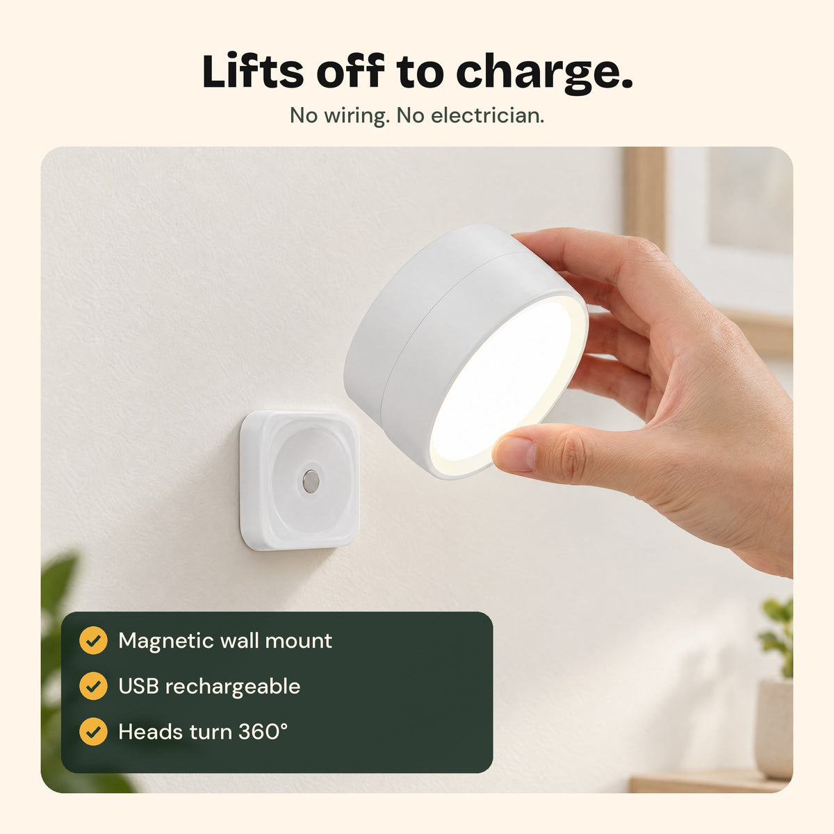 Twin Sconce light lifted off its magnetic wall mount to charge